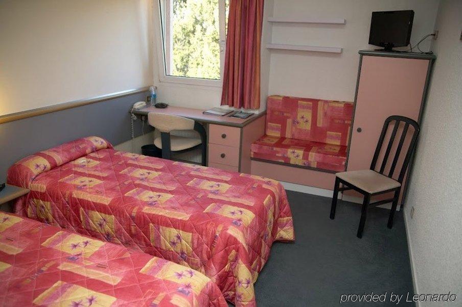 Brit Hotel Dak Hotel Avallon Pokoj fotografie