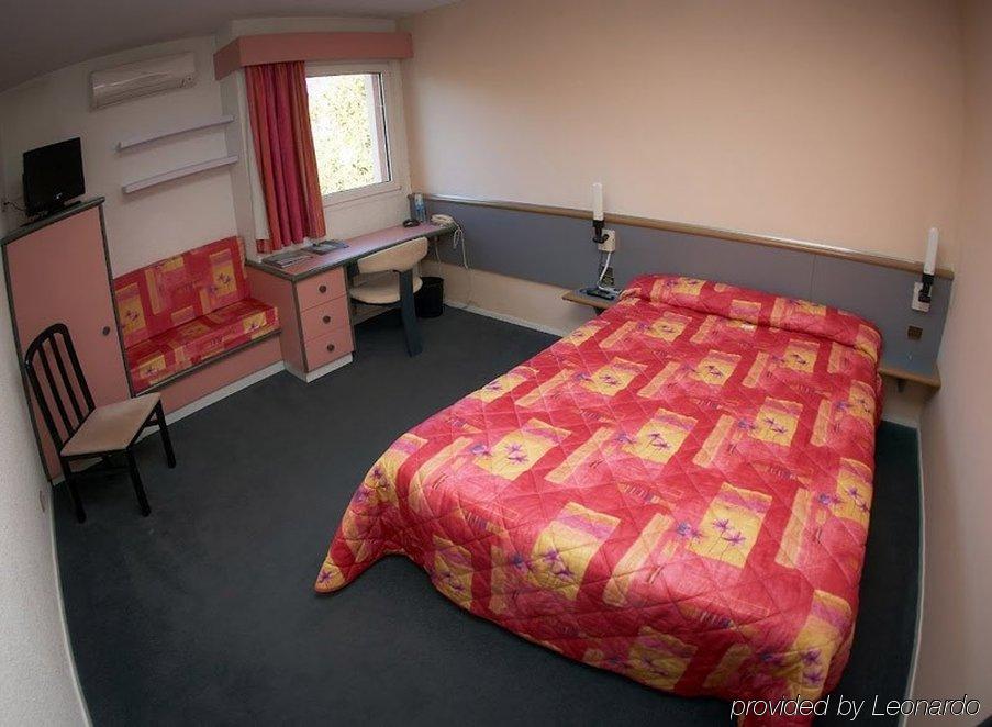 Brit Hotel Dak Hotel Avallon Pokoj fotografie