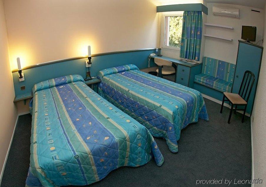 Brit Hotel Dak Hotel Avallon Pokoj fotografie